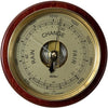Traditional German made barometer with brass dial and wooden frame, displaying weather changes.
