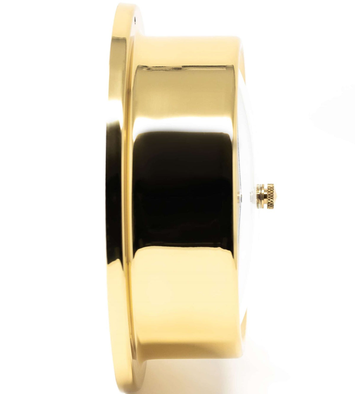 Side view of polished brass barometer with glass face and adjustment knob, nautical decor